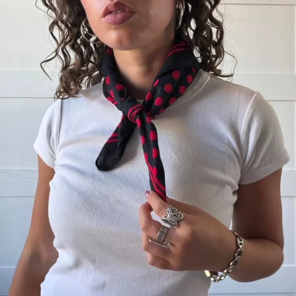 Vintage black cotton bandana featuring